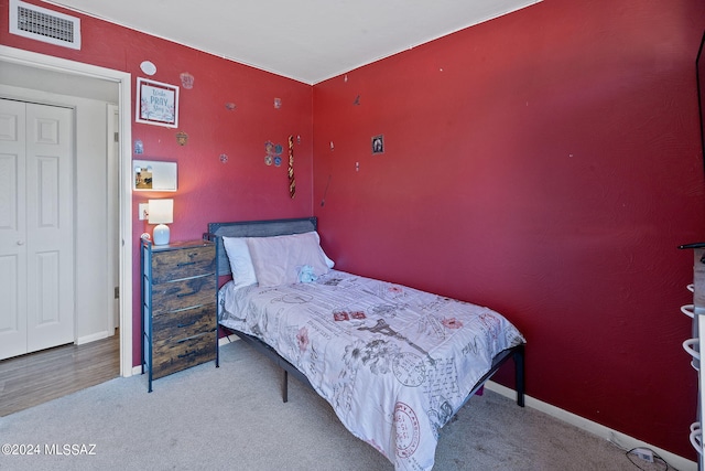 bedroom featuring carpet