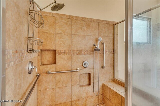 bathroom with an enclosed shower