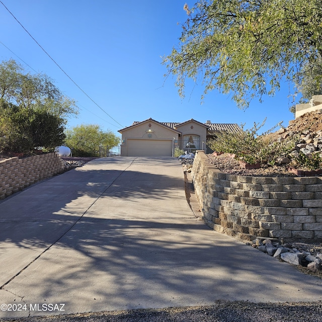 exterior space featuring concrete driveway