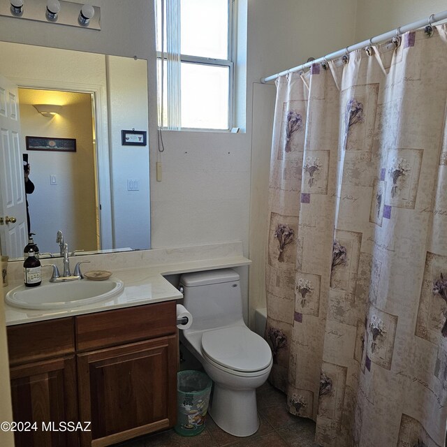 hallway featuring tile patterned flooring