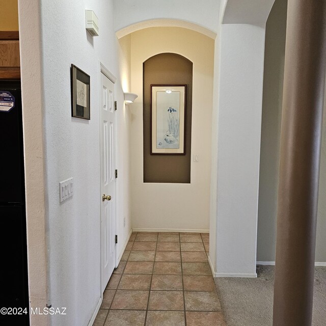 washroom with washing machine and clothes dryer