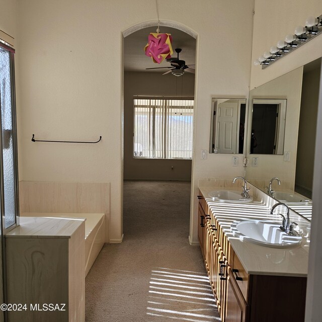 bathroom featuring independent shower and bath