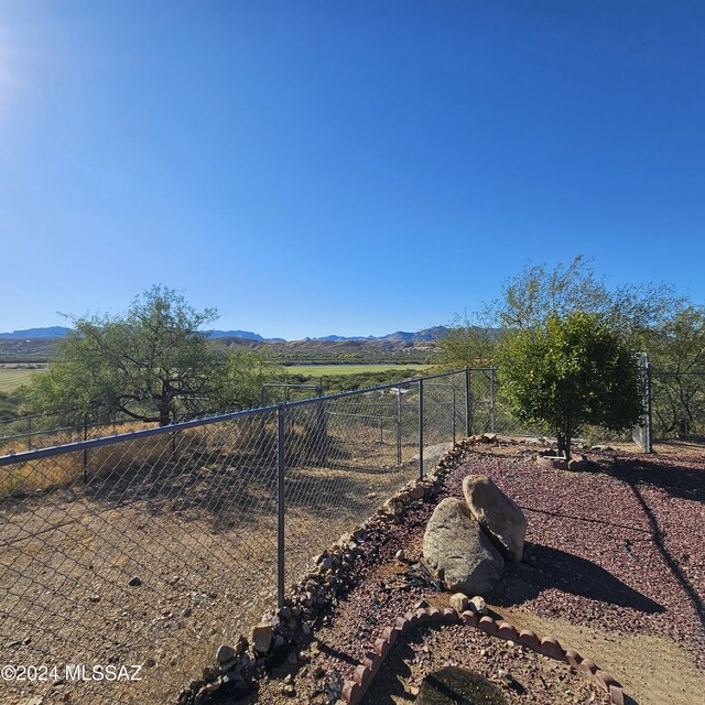 view of yard with a mountain view