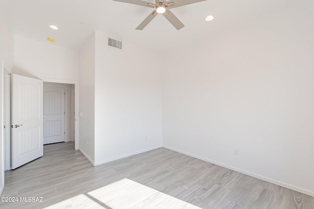 unfurnished room with light hardwood / wood-style flooring and ceiling fan