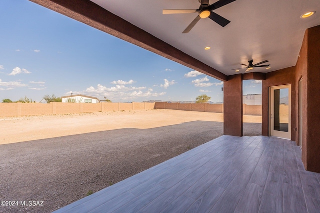 view of patio with ceiling fan