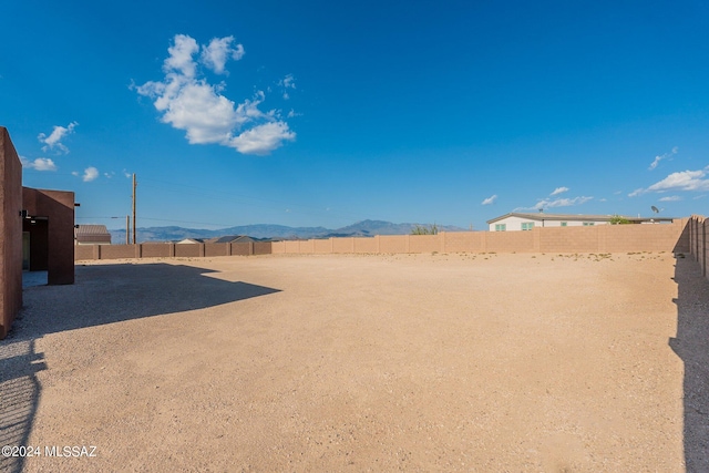 view of yard with a mountain view