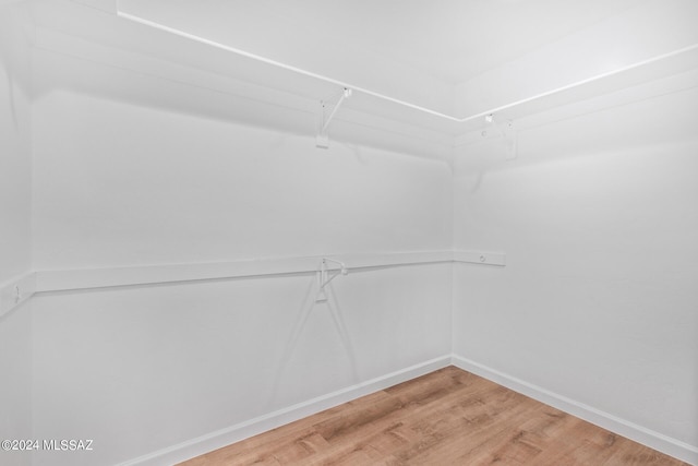 2521 S Pecan Valley Pl, Green Valley, AZ 85614 - walk in closet featuring wood finished floors