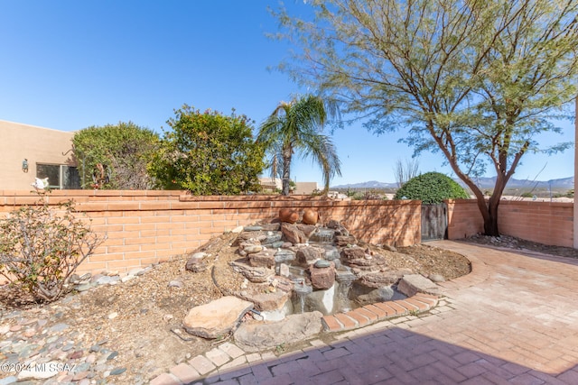 view of patio featuring a mountain view