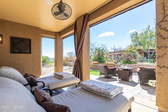 view of patio featuring a fenced backyard, outdoor dining area, and an outdoor living space