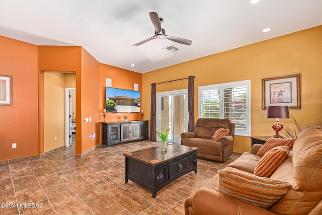 living area featuring visible vents, a ceiling fan, baseboards, and recessed lighting