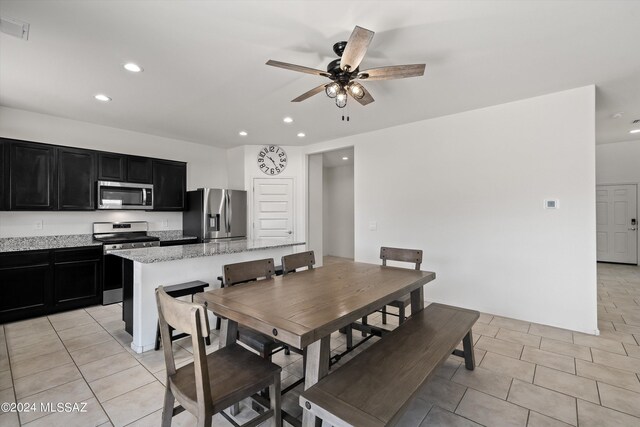 dining space featuring light tile patterned floors, visible vents, recessed lighting, and a ceiling fan