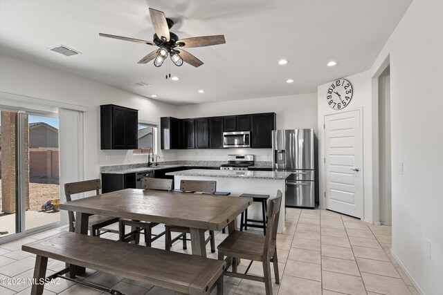 dining space featuring visible vents, baseboards, ceiling fan, recessed lighting, and light tile patterned floors