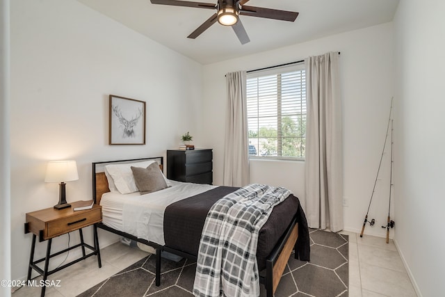 bedroom featuring ceiling fan and light tile patterned floors