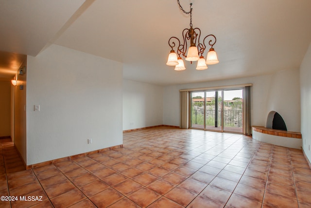 unfurnished living room featuring light tile patterned flooring and a notable chandelier