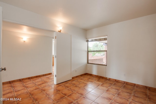 view of tiled empty room