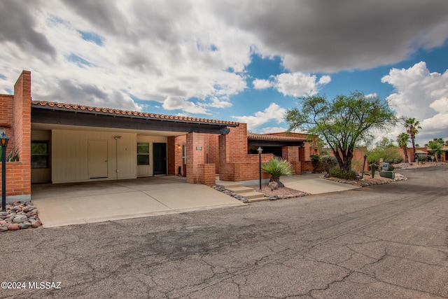 view of front of house with a carport