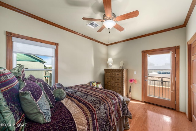 bedroom featuring ceiling fan, ornamental molding, light hardwood / wood-style floors, and access to exterior