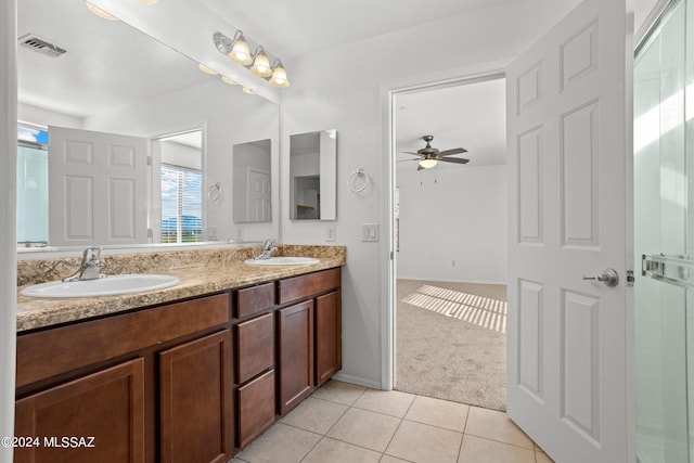 bathroom with vanity, ceiling fan, and tile patterned flooring