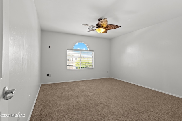 unfurnished room featuring carpet flooring and ceiling fan