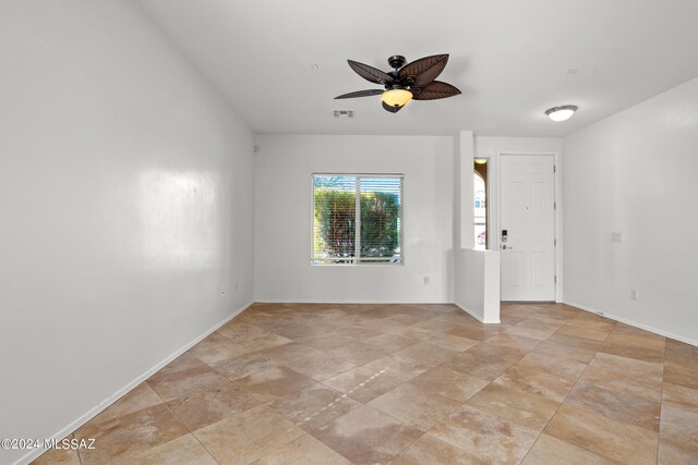 empty room with ceiling fan