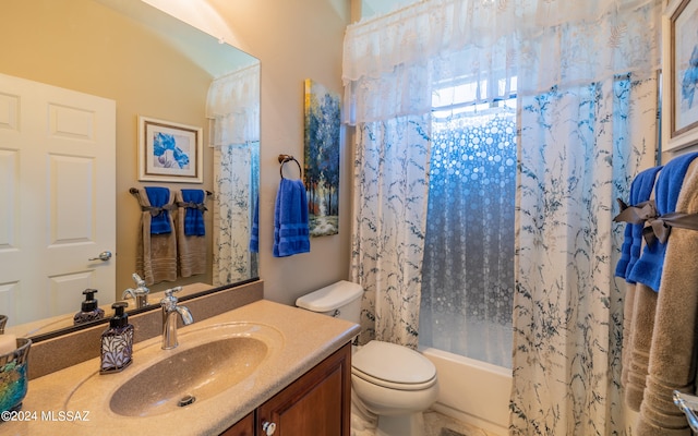 full bathroom featuring vanity, toilet, and shower / bathtub combination with curtain