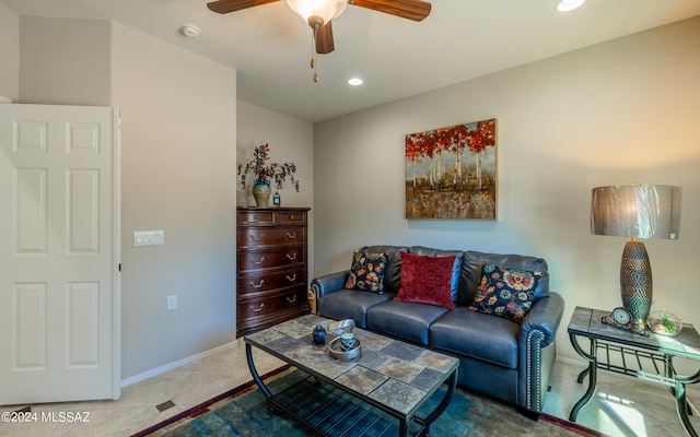 living room featuring tile patterned flooring and ceiling fan