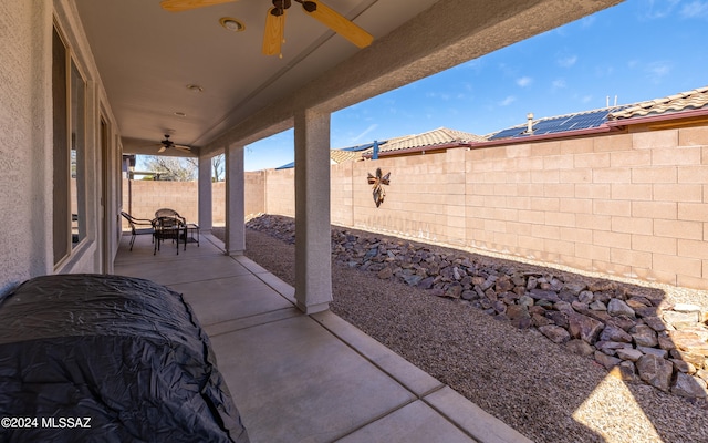 view of patio with ceiling fan