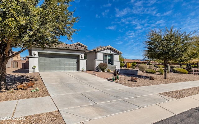 view of front of property featuring a garage