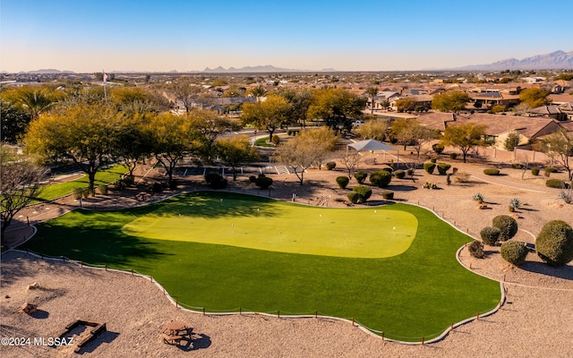 birds eye view of property with a mountain view