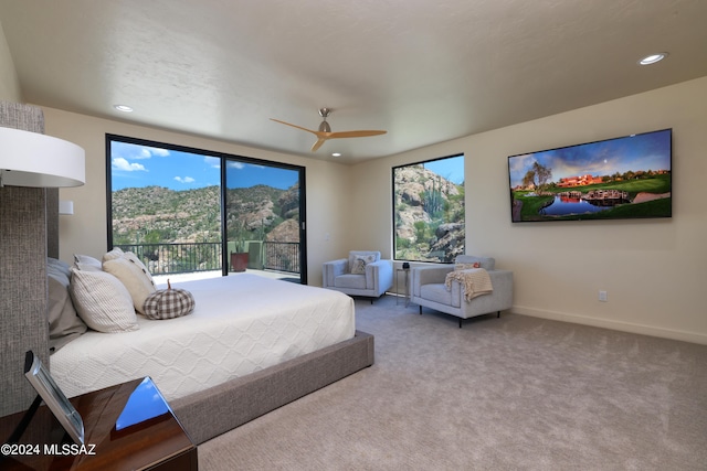 bedroom with carpet flooring, ceiling fan, and access to exterior