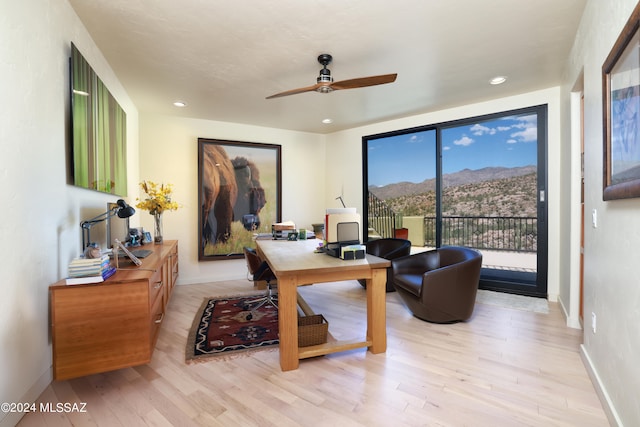 office featuring ceiling fan and light wood-type flooring