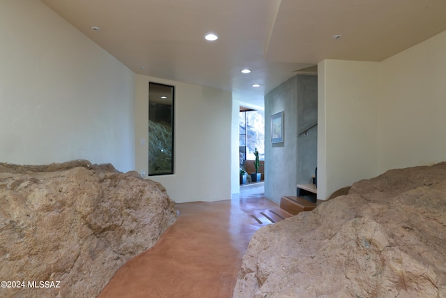 bedroom with concrete flooring