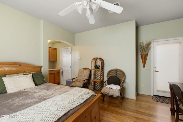 bedroom featuring light hardwood / wood-style flooring and ceiling fan