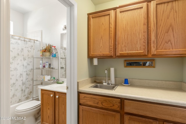 full bathroom with vanity, toilet, and shower / bath combo with shower curtain