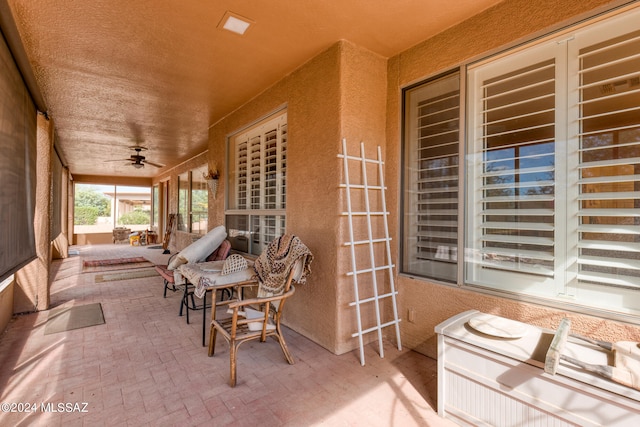 view of patio with ceiling fan