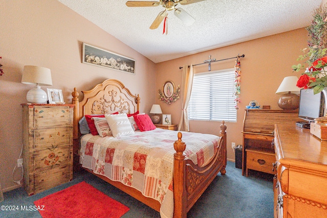 carpeted bedroom with ceiling fan, a textured ceiling, and vaulted ceiling