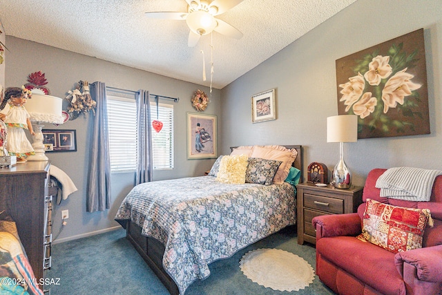 bedroom with a textured ceiling, lofted ceiling, dark carpet, and ceiling fan