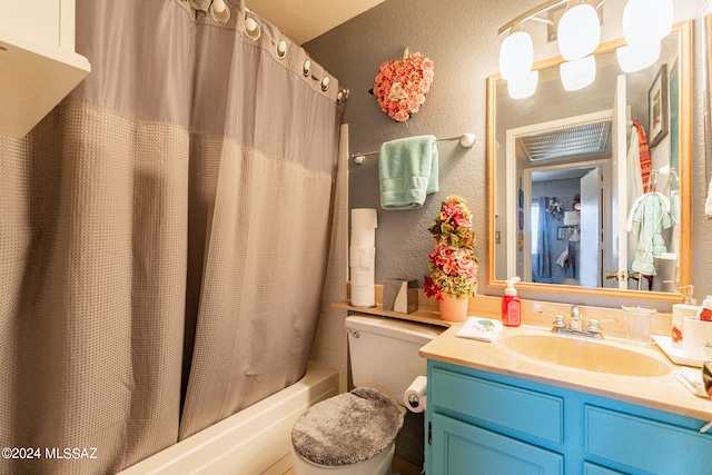 full bathroom featuring shower / bath combination with curtain, vanity, and toilet