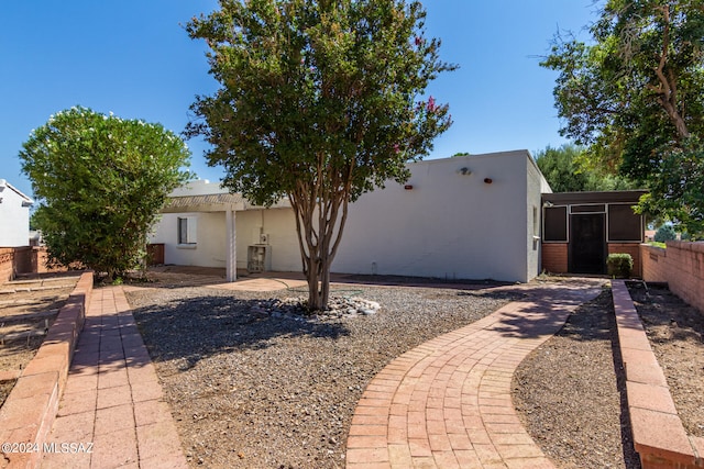 view of front of home featuring a patio area