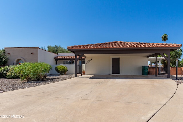 view of front of house with a carport