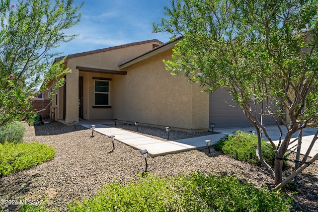 exterior space with a garage