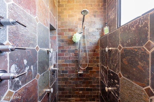 details with a tile shower