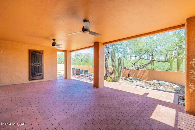 view of patio featuring ceiling fan and outdoor lounge area