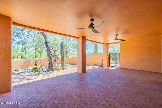 view of patio featuring ceiling fan