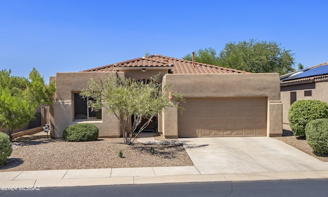 view of front of home with a garage