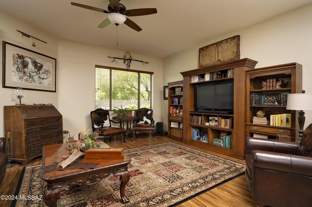 dining room with wood-type flooring and ceiling fan