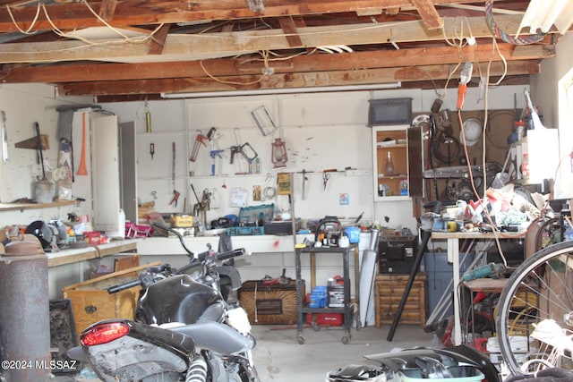 garage with a workshop area