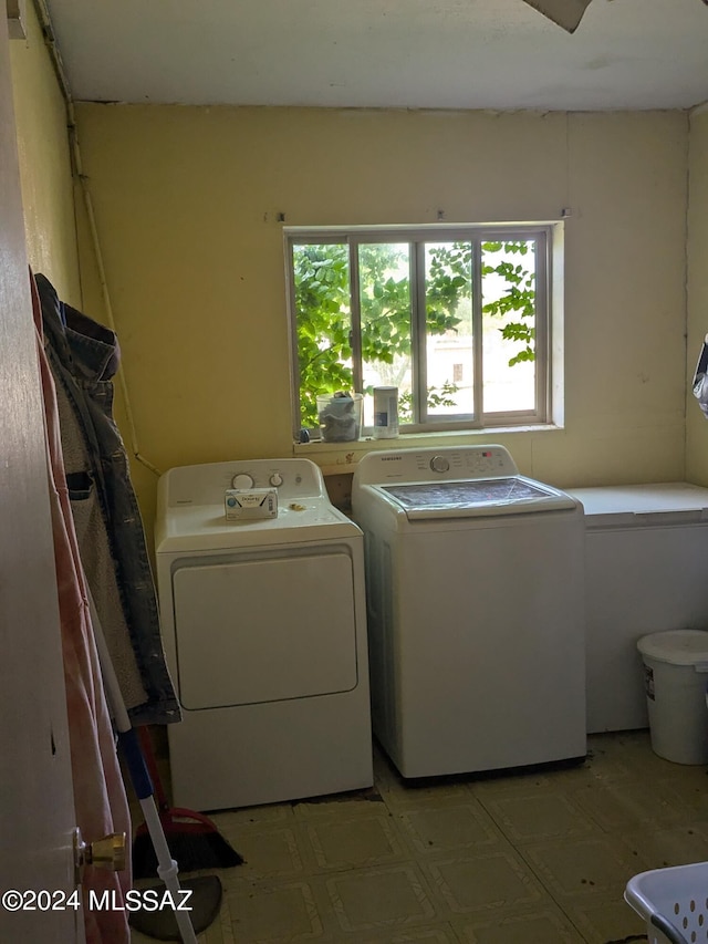 laundry area featuring washing machine and dryer