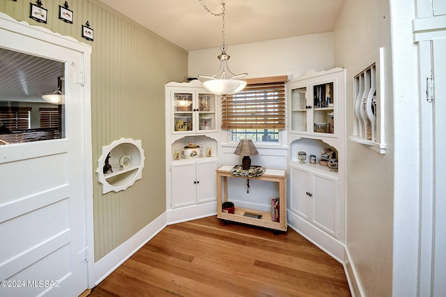 dining room with hardwood / wood-style flooring