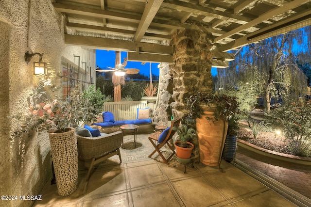 patio at night with an outdoor living space